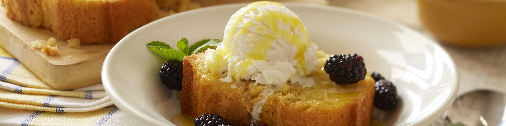 domino golden sugar pound cake with warm lemon sauce and vanilla ice cream