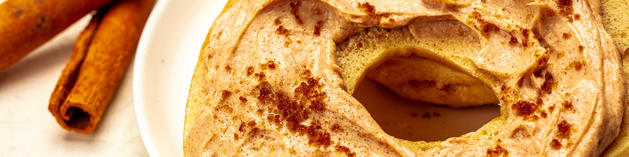 domino brown sugar cinnamon cream cheese spread on bagel
