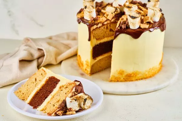 slice of s&#039;mores cake baked with domino light brown sugar